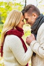 Portrait of mature couple making a vow in park