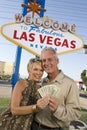 Portrait Of A Mature Couple With Money Royalty Free Stock Photo
