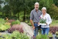 Portrait Of Mature Couple Shopping At Garden Center Royalty Free Stock Photo