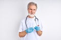 Portrait of mature doctor man with sampling tube of infected person corona virus in laboratory
