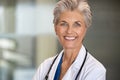 Portrait of mature doctor smiling Royalty Free Stock Photo