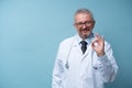 Portrait of a mature doctor standing in a hospital Royalty Free Stock Photo