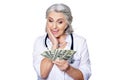 Portrait of a mature female doctor with money Royalty Free Stock Photo