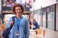 Portrait Of Mature Female Teacher Or Student In College Hall Royalty Free Stock Photo