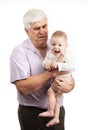 Portrait of a mature grandfather holding grandson