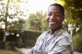 Portrait Of Mature Man In Back Yard Garden Royalty Free Stock Photo