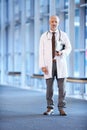 Portrait, mature man and doctor with checklist in hospital for healthcare, wellness or service in Canada. Career Royalty Free Stock Photo