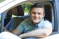 Portrait Of Mature Man Driving Car Royalty Free Stock Photo