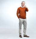 Portrait, mature man and finger pointing in studio with mockup, smile and happiness in white background. Fashion, formal