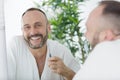 portrait mature man holding toothbrush Royalty Free Stock Photo