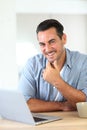 Portrait of mature man on laptop Royalty Free Stock Photo