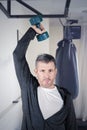 Mature man lifting a dumbbell in the gym center Royalty Free Stock Photo