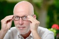 Portrait of a mature man near a window Royalty Free Stock Photo