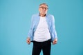 Portrait of mature man showing his empty pockets Royalty Free Stock Photo