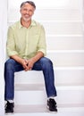 Portrait, mature man and smile in office by stairs, career pride and designer in mockup. Person, happy face and senior Royalty Free Stock Photo