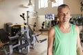 Portrait Of Mature Man Standing In Gym Royalty Free Stock Photo