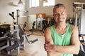 Portrait Of Mature Man Standing In Gym Royalty Free Stock Photo