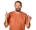 portrait of mature man with thumbs up. concept of victory, goal accomplished, business achievement, ok, well done, teamwork Royalty Free Stock Photo