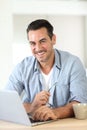 Portrait of mature man typing on laptop Royalty Free Stock Photo