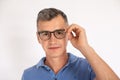 Portrait of mature man wearing eyeglasses looking at camera Royalty Free Stock Photo