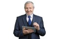 Portrait of mature smiling man with tablet. Royalty Free Stock Photo