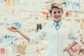 Portrait of Mature Smiling Pharmacist in Drugstore Royalty Free Stock Photo