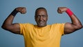 Portrait mature sports african man posing in studio gray background strong muscular athletic male athlete sportsman Royalty Free Stock Photo