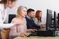 Mature woman listening young female coach Royalty Free Stock Photo