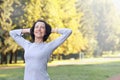 Portrait of mature woman before or after jog in the park Royalty Free Stock Photo
