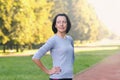 Portrait of mature woman before or after jog in the park Royalty Free Stock Photo