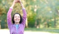 Portrait of mature woman before or after jog in the park Royalty Free Stock Photo