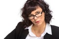 Portrait of mature woman smiling, wearing glasses, looking at ca Royalty Free Stock Photo