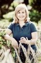 Portrait of mature woman standing in garden Royalty Free Stock Photo