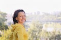 Portrait of mature woman weared in sports clothes in the park Royalty Free Stock Photo