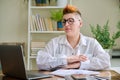 Portrait of mature woman working at home on computer laptop Royalty Free Stock Photo