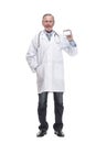 Portrait of medical doctor in face mask arms crossed, standing Royalty Free Stock Photo