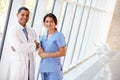 Portrait Of Medical Staff In Corridor Of Hospital Royalty Free Stock Photo