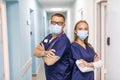 Portrait Of Medical Staff In Corridor Of Modern Hospital Royalty Free Stock Photo