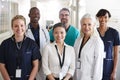 Portrait Of Medical Team Standing In Hospital Corridor Royalty Free Stock Photo