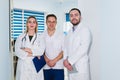 Portrait of medical team standing in hospital hall Royalty Free Stock Photo