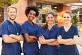 Portrait Of Medical Team Standing Outside Hospital