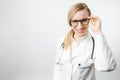 Portrait of medical worker in lab coat and eyeglasses