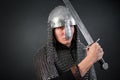 Portrait of a medieval warrior of the late Viking era and the beginning of the Crusades. Knight in chain mail and helmet