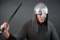 Portrait of a medieval warrior of the late Viking era and the beginning of the Crusades. Knight in chain mail and helmet