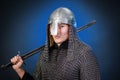 Portrait of a medieval warrior of the late Viking era and the beginning of the Crusades. Knight in chain mail and helmet