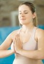 Portrait of meditating young smiling woman Royalty Free Stock Photo