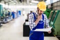 Portrait of an metal engineer working at factory