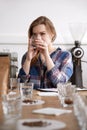 Female barista at coffee cupping smelling coffee