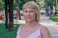 Portrait of a middle-aged blonde woman pretty smiling