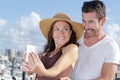 Portrait middle-aged couple taking selfie with smartphone Royalty Free Stock Photo
